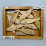 Clive Fredriksson, a wooden relief study of sardines, 39cm x 49cm