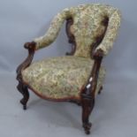 A Victorian mahogany and upholstered open armchair