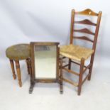 A ladder-back rush-seated dining chair, a needlework upholstered footstool, and a swing toilet