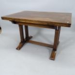 A 1930s oak draw leaf dining table, 122cm extending to 182cm x 78cm x 84cm