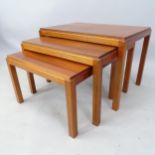 A nest of 3 mid-century teak Gordon Russell occasional tables, the tops with reefed edge, largest
