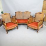 A 1920s mahogany-framed and double-cane panelled Bergere 3-piece suite, comprising 2-seater settee