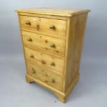A modern pine chest of 4 drawers, 60cm x 94cm x 47cm
