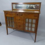 R J Horner, an American Arts and Crafts Mission sideboard, with glazed doors and mirror-back in