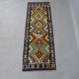 A Chobi Kilim runner, 200 x 69cm