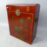 A Chinese red lacquered storage box, with lifting lid and painted floral decoration, 46 x 59 x 26cm
