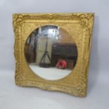 An Antique giltwood and gesso wall mirror, 69cm x 69cm