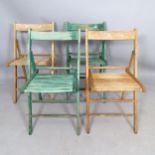 A set of 4 modern pine folding chairs