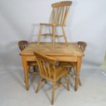A Vintage pine farmhouse kitchen table, 107 x 77 x 88cm, and a set of 4 slat-back dining chairs