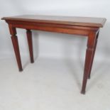 An early 20th century mahogany console table, on square tapered legs, with fluted decoration, 122