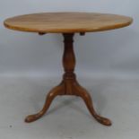 A mahogany tilt-top occasional table, on tripod base, 79 x 70cm