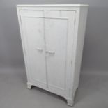 A mid-century Art Deco style painted wardrobe, with label for BCM/HL, 84cm x 141cm x 46cm