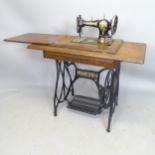A Vintage Jones treadle sewing machine, 92 x 75 x 47cm