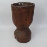 An African hardwood plant stand, 34cm x 67cm