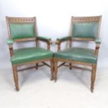 A pair of 1930s oak and green faux leather upholstered armchairs