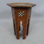 A small Anglo-Moorish hexagonal occasional table, in the manner of Liberty & Co, with inlaid