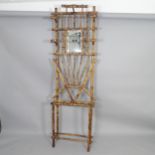 An Antique bamboo mirror-back hall stand, 63 x 200 x 24cm