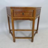 An early 20th century mahogany hall table, of canted form with single fitted drawer, 100 x 87 x 44cm