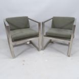 A pair of contemporary steel-framed and upholstered lounge chairs, 60 x 67 x 76cm