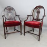 A pair of 19th century style dining chairs, with carved shield backs