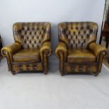 A pair of Thomas Lloyd studded brown leather upholstered wing armchairs, 96 x 100 x 100cm, seat 48 x