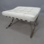 A Barcelona style white leather-upholstered ottoman/footstool