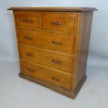 An early 20th century oak chest of 2 short and 3 long drawers, with carved decoration, 98 x 101 x