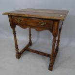 A contemporary mahogany side table, by Theodore Alexander, with single fitted drawer, H-shaped