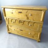 An Antique pine chest of 3 long drawers, 123 x 102 x 65cm
