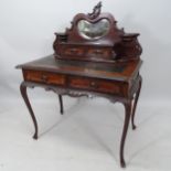 A Victorian mahogany lady's writing desk, with raised mirrored back, tooled and embossed leather