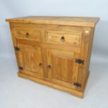 A contemporary pine sideboard, having 2 fitted drawers and cupboards under, 108 x 90 x 52cm