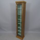 A Vintage pine single door cabinet, with shelved interior, 33 x 157 x 25cm
