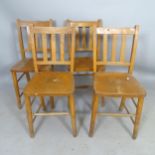A set of 4 mid-century stained wood school chairs