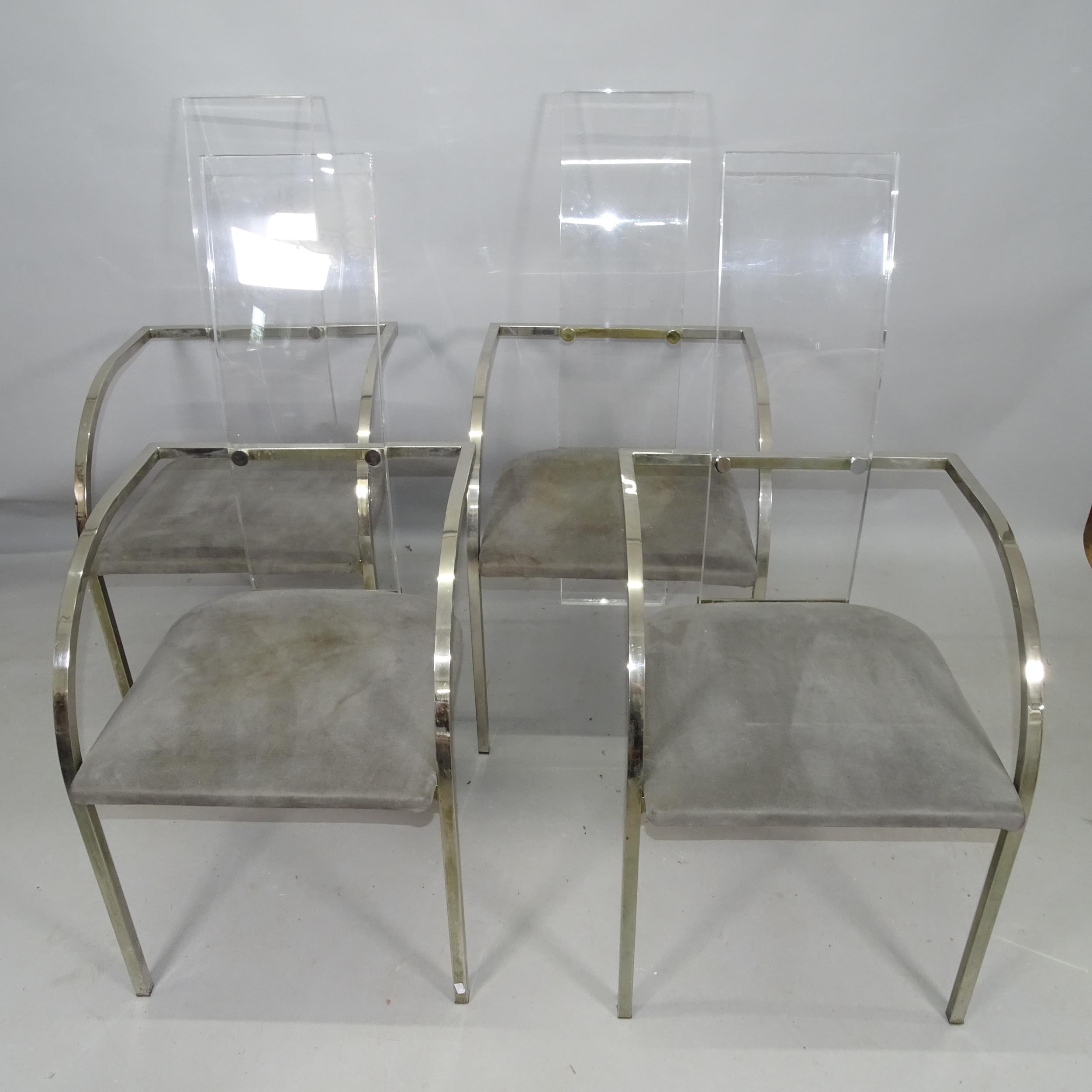A set of 4 1970s lucite high-back dining chairs with nickel plated steel frame