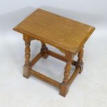 A reproduction oak joint stool, 45cm x 45cm x 28cm
