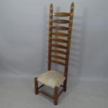 A mid-century French tall ladder-back chair, in the manner of Charles Dudouyt