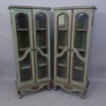 A pair of modern painted cabinets, having 2 glazed doors and 3 fitted shelves, each 53 x 125 x 26cm