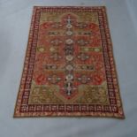 A Kashmiri design chain stitch rug, with retail label for Debenhams, 178 x 122cm