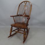 An oak and elm seated Windsor rocking chair