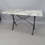 A rectangular marble-top garden table, on cast-iron base, 120 x 71 x 6cm