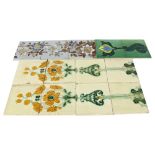 A group of Art Nouveau style ceramic tiles, with various floral patterns, largest 15cm