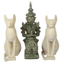 A Thai celadon glaze pottery temple figure, height 40cm, and a pair of granite Bastet figures (3)