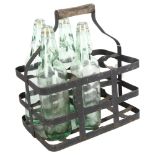 A Vintage bottle carrier with 4 codd-neck bottles with glass marbles, all bottles marked with