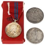 An Edward VII silver crown 1902, a Victorian silver double florin 1889, and a Queen Elizabeth II
