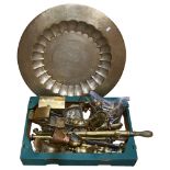 An Anglo-Indian brass engraved serving tray, several brass syringes or garden rose sprayers, various