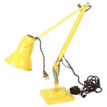 HERBERT TERRY - a Vintage yellow painted anglepoise lamp on stepped base