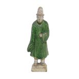 An Antique glazed terracotta figure, height 24cm