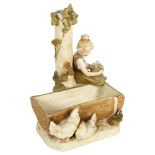 Royal Dux group, girl and hens by a trough, height 25cm
