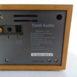 A Tivoli audio model CD, with speakers, cables and remote control. Model reference R1966405032