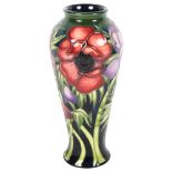 A Moorcroft tube-lined baluster vase, with anemone design, 20cm